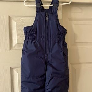 Navy blue size 12 mo Carter’s snow bib overalls.